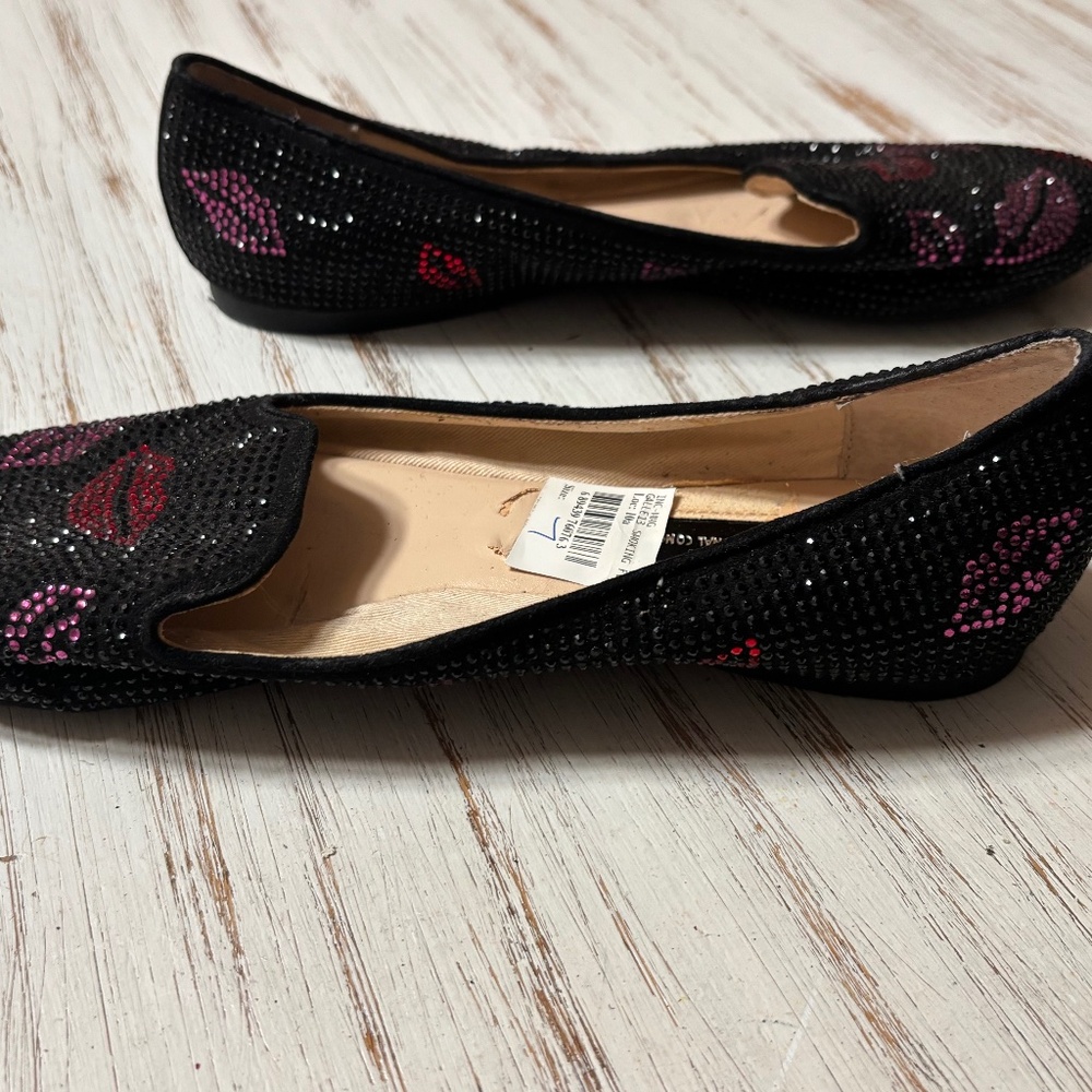 INC size 7M black flats with red and pink lips crystal shoes.